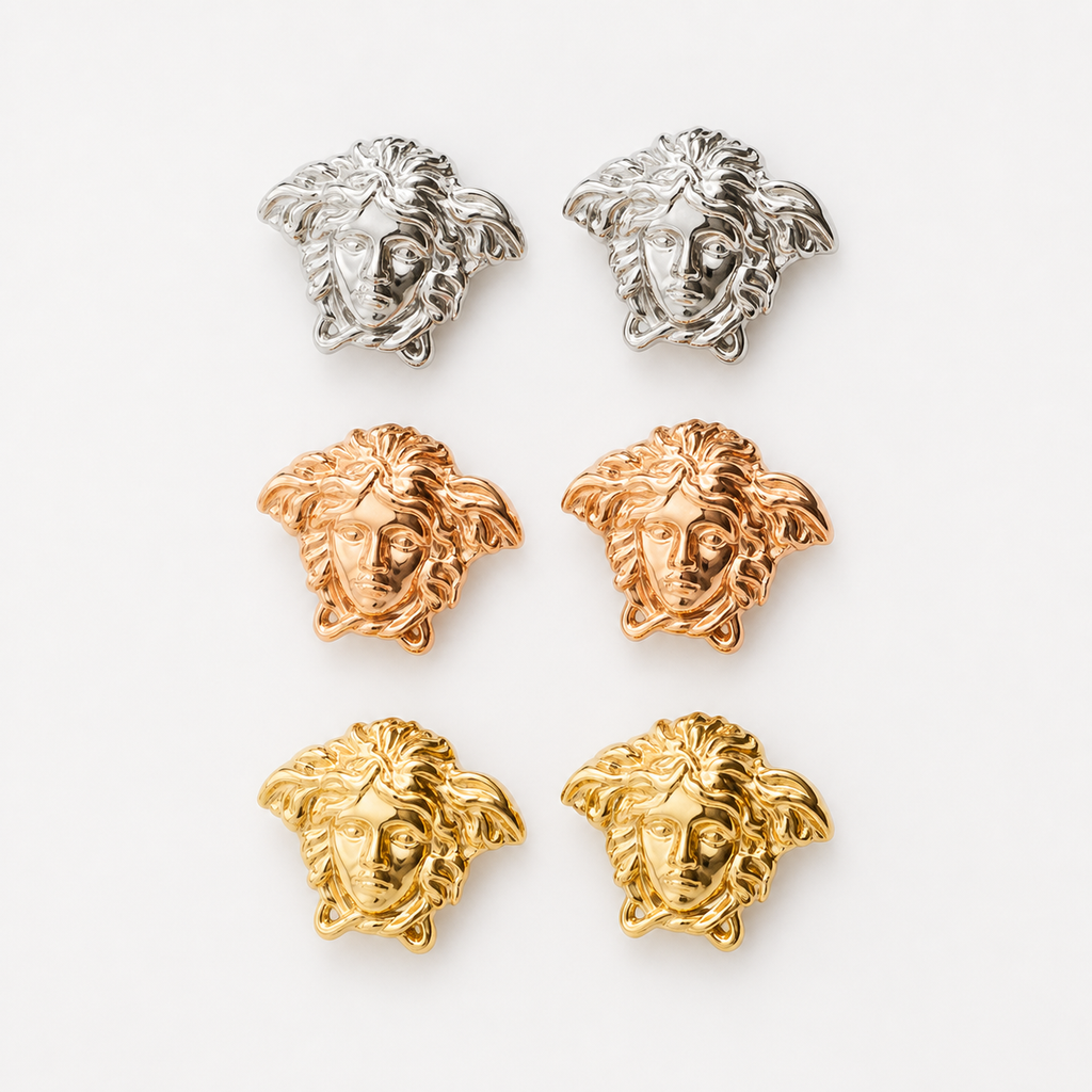 Professional studio product photo of 9ct Gold Mythology Medusa Cut-out Earrings on white background