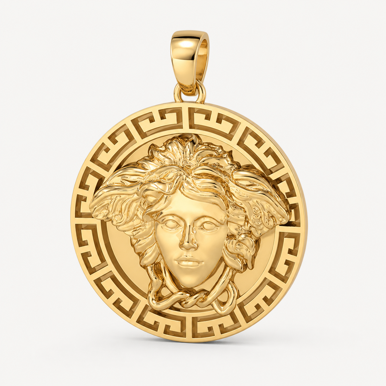 Professional studio product photo of 9ct Gold Large Mythology Medusa Pendant on white background
