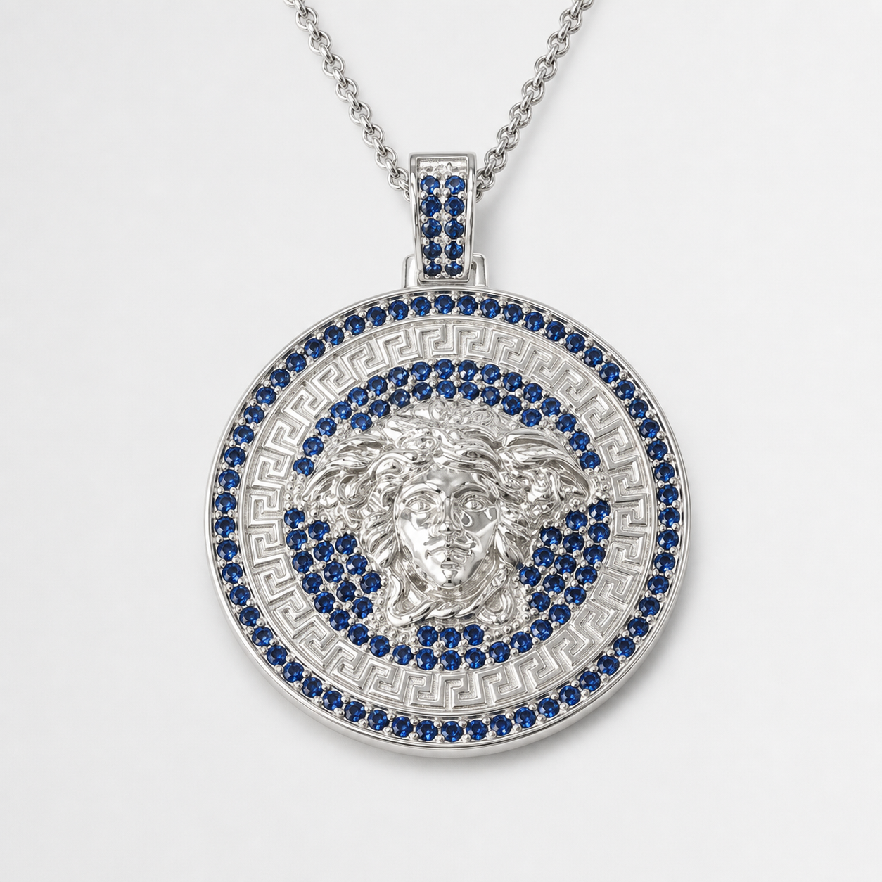 Professional studio product photo of Blue CZ Mythology Medusa (large) Pendant & Chain Blue on white background