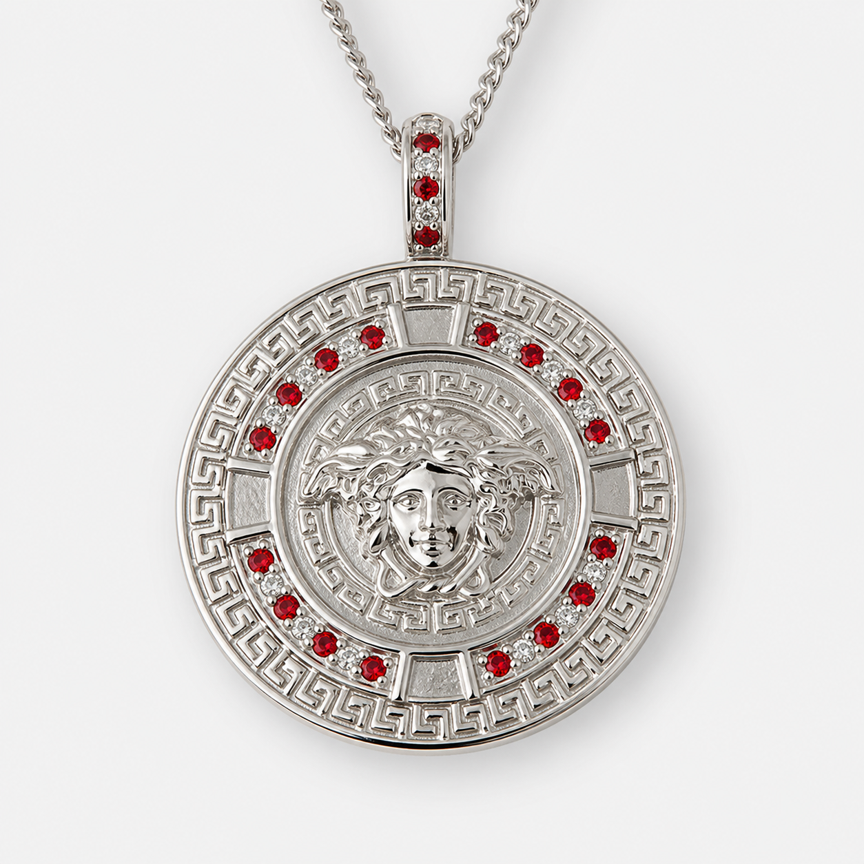 Professional studio product photo of Greek Key Mythology Medusa Big Pendant Red CZ Stones + Sterling Silver Chain on white background
