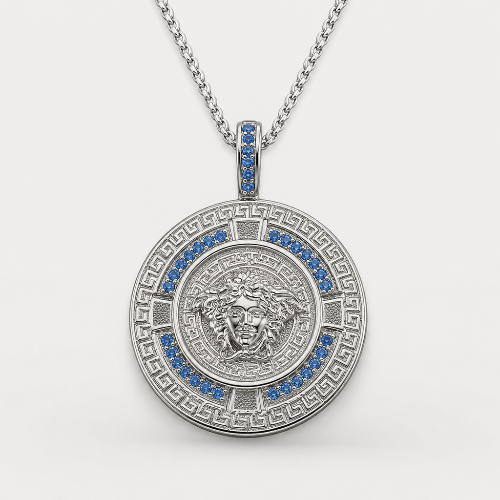 Professional studio product photo of Greek Key Mythology Medusa Big Pendant Baby Blue CZ Stones + Sterling Silver Chain on white background
