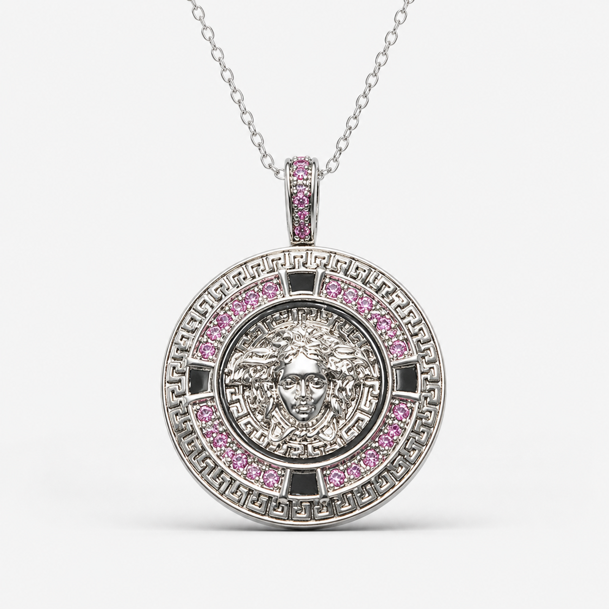 Professional studio product photo of Greek Key Mythology Medusa Pendant Pink CZ Stones + Sterling Silver Chain on white background