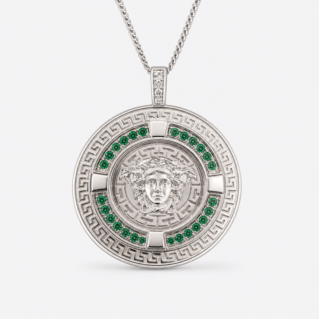 Professional studio product photo of Greek Key Mythology Medusa Pendant Green CZ Stones + Sterling Silver Chain on white background