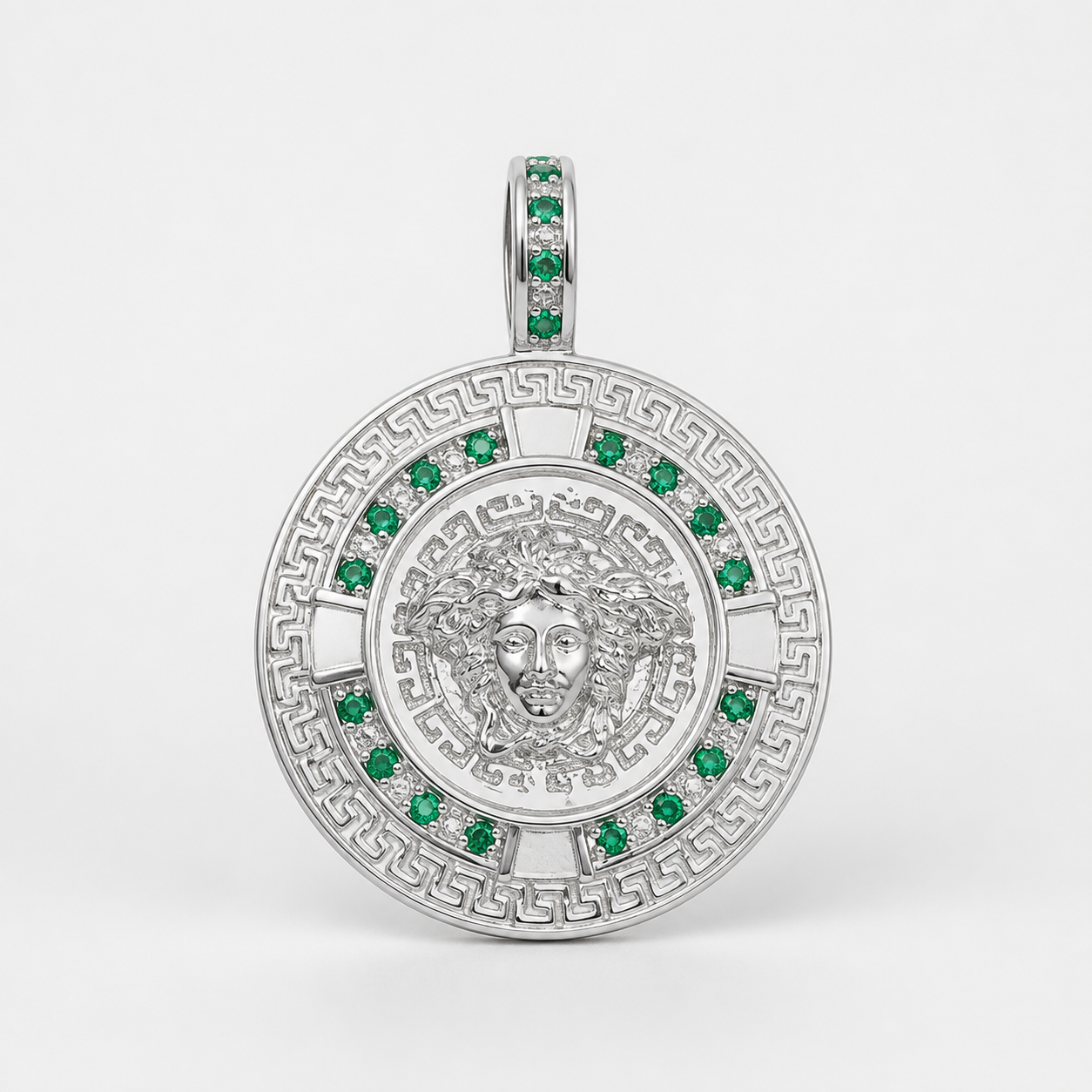 Professional studio product photo of Greek Key Mythology Medusa Big Pendant Green CZ Stones + Sterling Silver Chain on white background