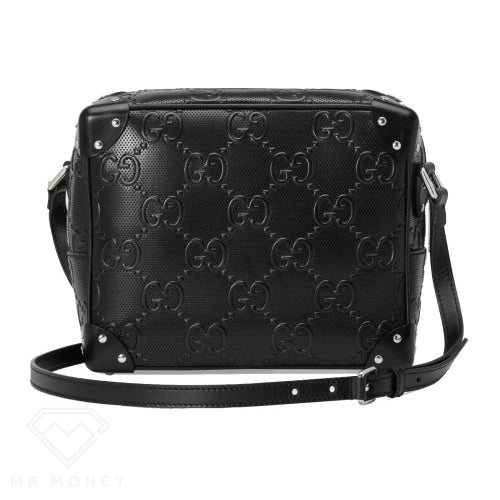 Gucci Gg Embossed Shoulder Bag Black Handbags